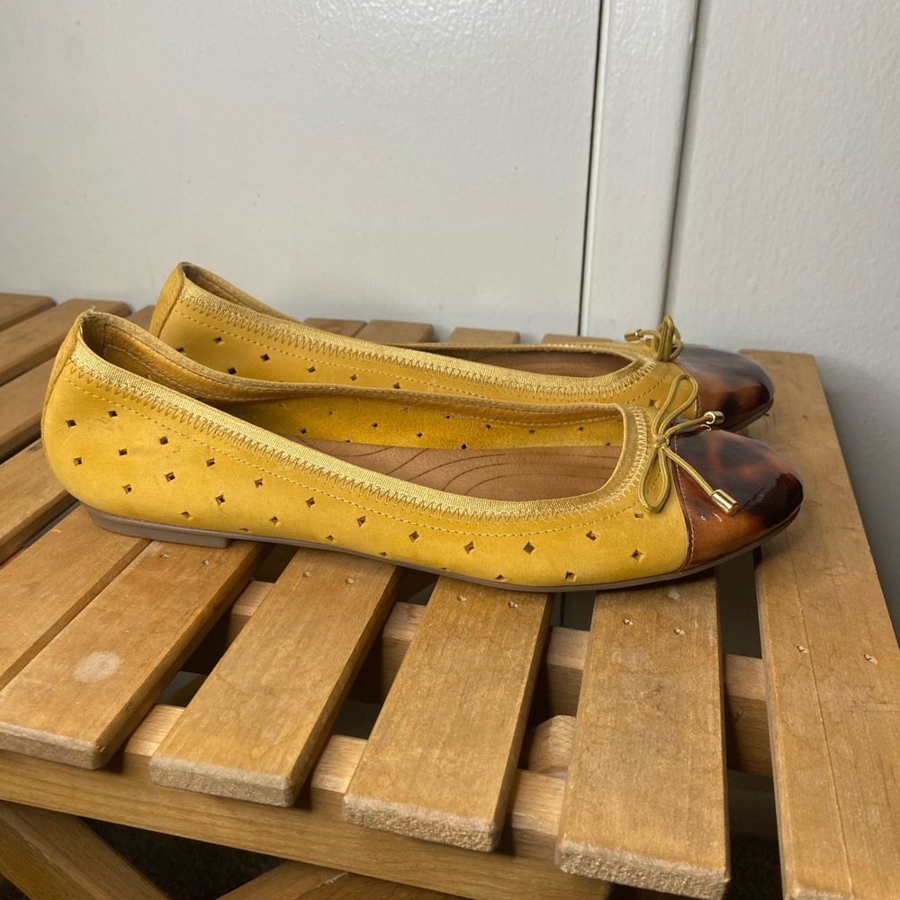 Clarks Yellow and Brown Flats with Decorative Perforations